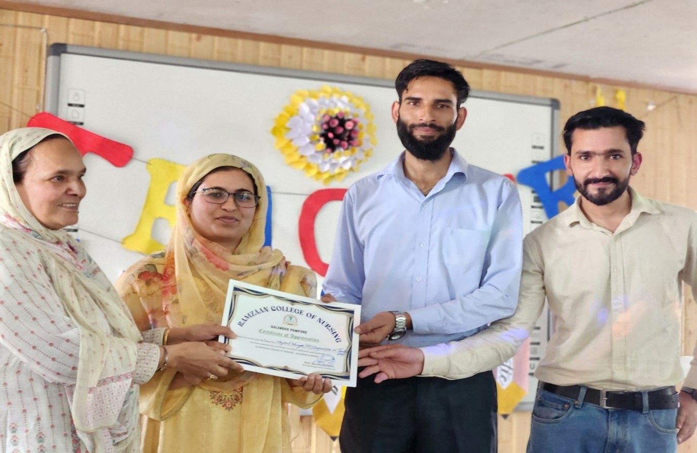Organizers of Teacher's Day 2024 receiving appreciation on the event.