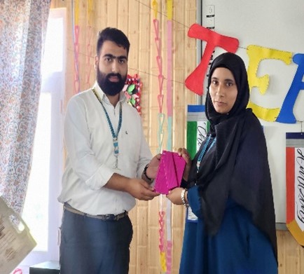 Teachers receiving token of appreciation on Teacher's Day 2024