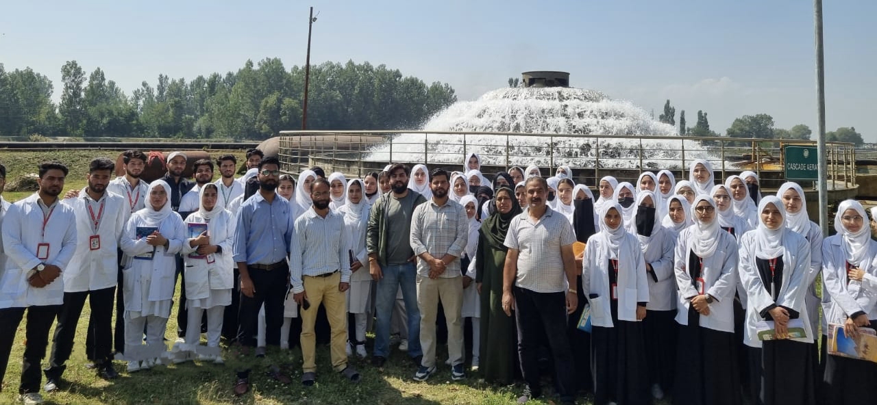 Students with Staff of Water Plant