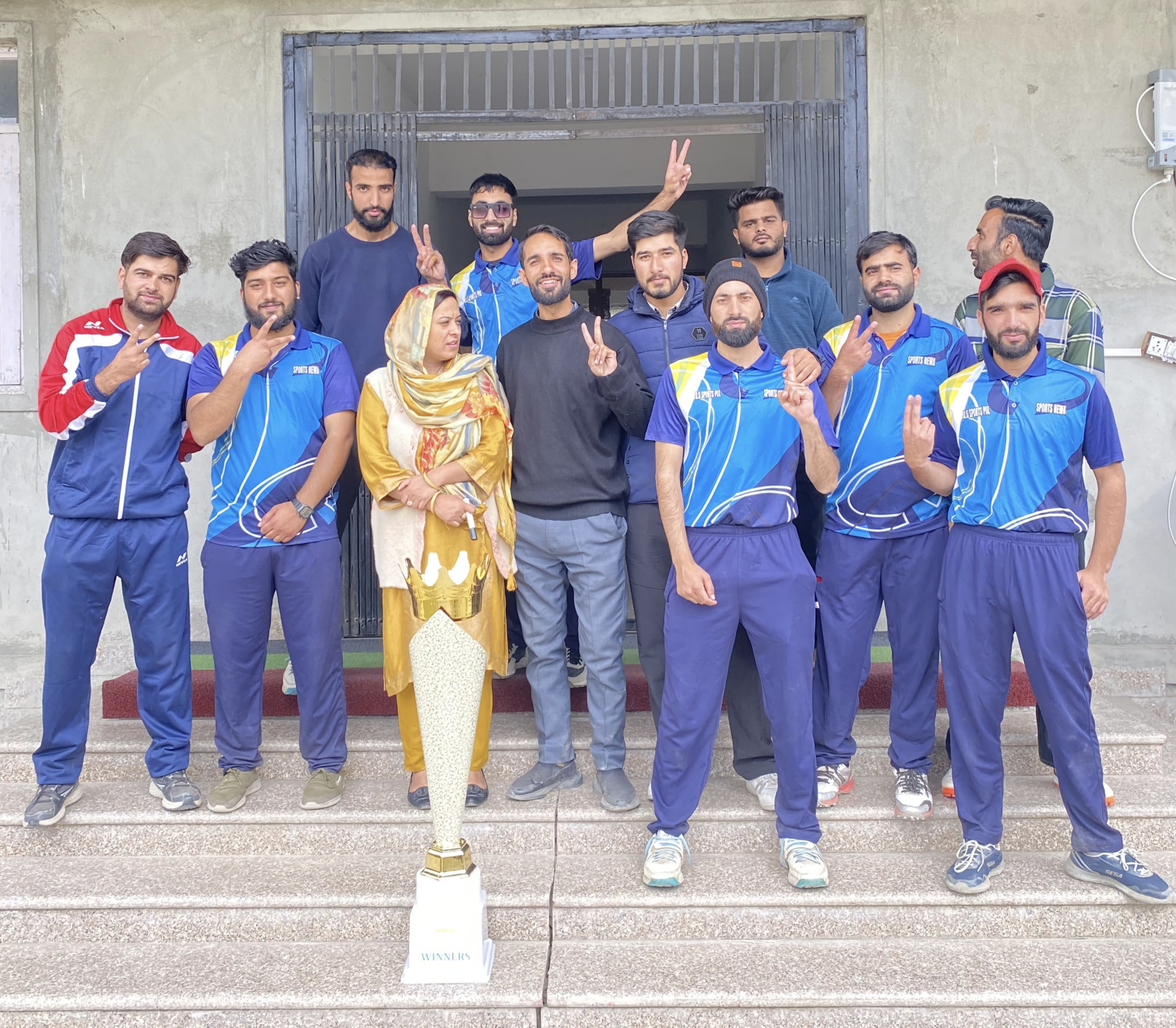 Winners posing with Mrs. Batula (AP) and Mr. Rayees (AP)