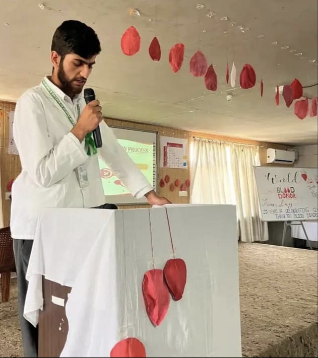 Sahil Farooq delivering a speech on the day.